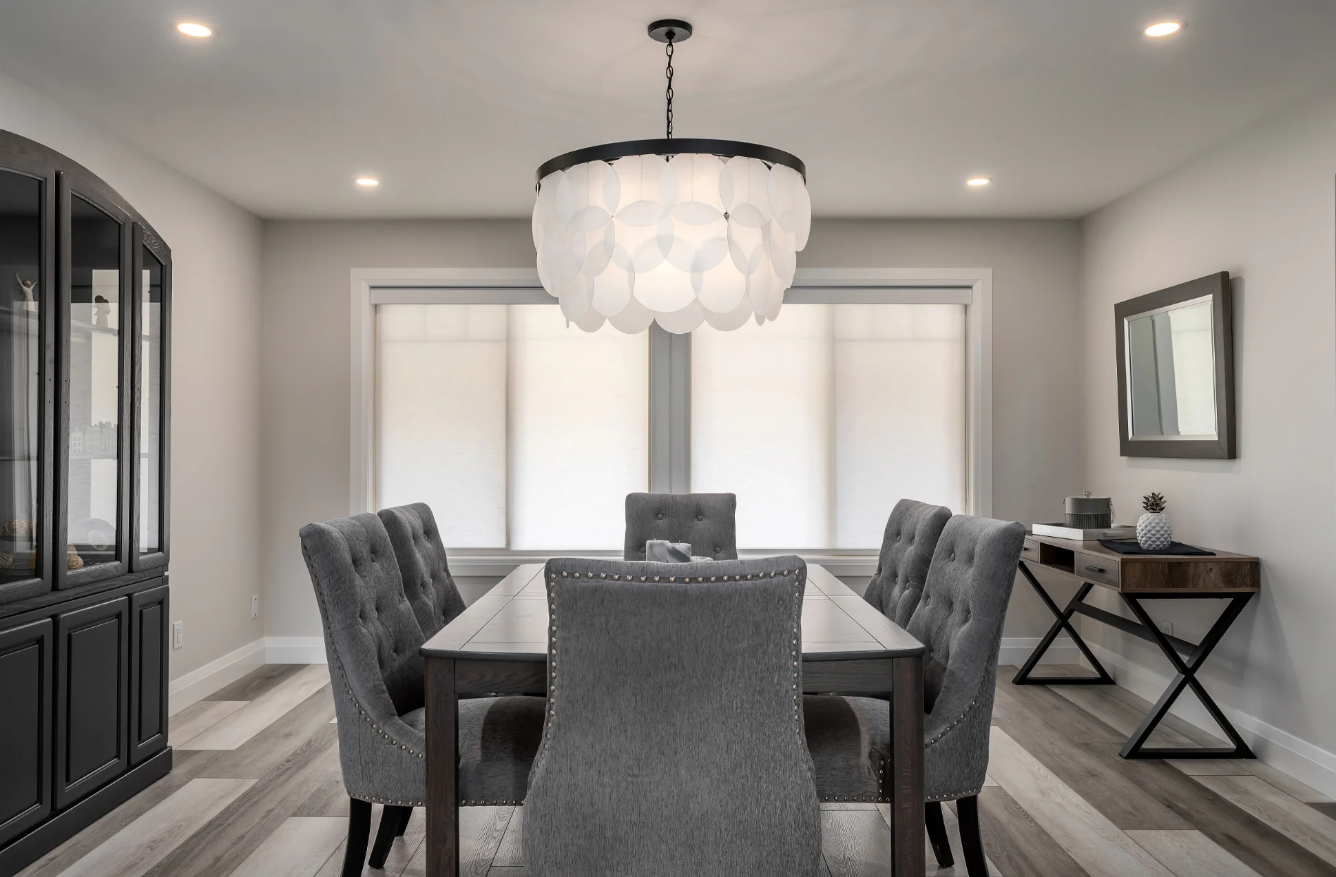 Contemporary living room renovation in light shades with grays and browns